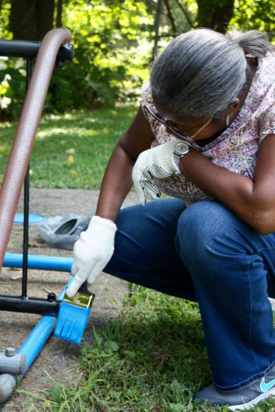 Volunteer Painting at the Park