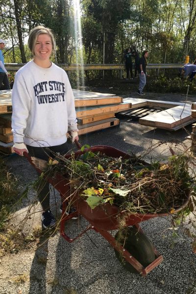 volunteer with wheel-barrel